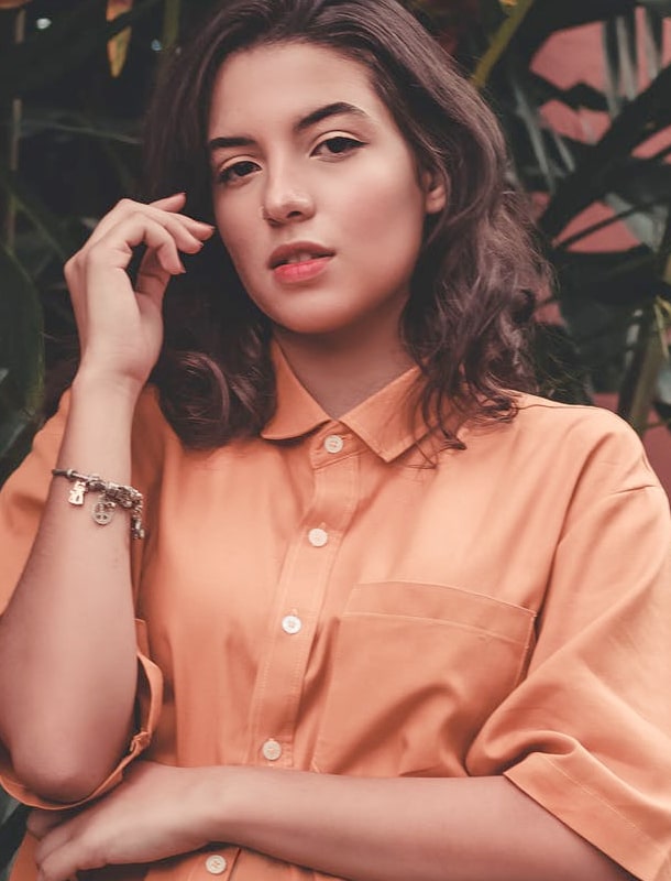 woman in button
          shirt